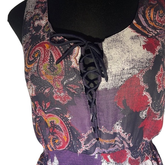 Free People beautiful dress. Size. L. Ties detail in front.  Pockets - Picture 2 of 9